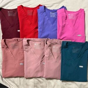 Figs Scrub Tops in Red, Purple, Pink, and Teal